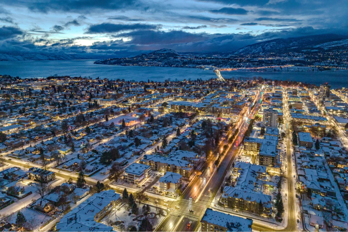 Drone shot of buildings in Kelowna, British Columbia, Canada in the evening